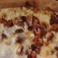 Barbecue Chicken Pizza · Topped with BBQ sauce, mozzarella, and chicken meat.