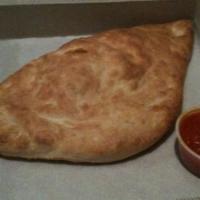 Calzone · With sauce and one topping.