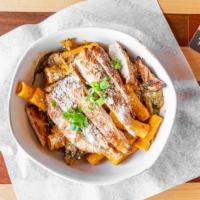 Taphouse Rigatoni · Grilled chicken, mushrooms, spinach, red pepper cream sauce tossed with Rigatoni.