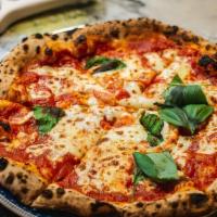 Pizza Margherita · marinara, fresh mozzarella & basil.