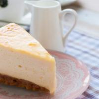 Ny Cheesecake Slice · Creamy, rich NY-style cheesecake.