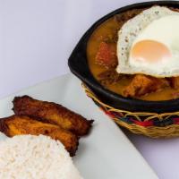 Casùela De Frijoles · Colombian style ground beef, rice, beans, fried egg, and sweet plantain.