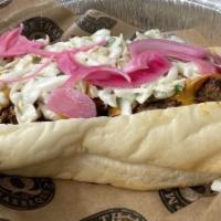 Goldman Triple Hot Dog
 · Bacon-wrapped hot dog, pulled pork, SC BBQ sauce, creamy slaw, pickled red onions.