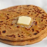 Aalu Paratha
 · Whole Wheat flatbread filled with spices and mashed potatoes (layered and shallow fried).