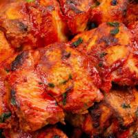 Chicken Tikka  · Boneless Chicken boti marinated in special masala and baked in a tandoor clay oven.