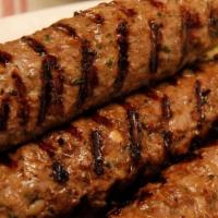 Beef Seekh Kabab · Seasoned ground meat (beef) grilled on a skewer. 
(1 pcs)