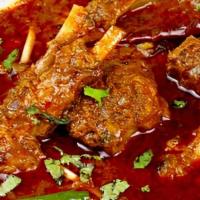 Lamb Curry · Lamb meat mixed with masala and herbs