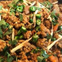 Tawa Keema · Ground chicken meat cooked on special Tawa (flat pan) mixed with onion, ginger, garlic, and ...