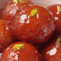 Gulab Jamun 2 Pcs
 · Soft and delicious fried milk balls and soaked in rose flavored sugar syrup.  Two pieces.