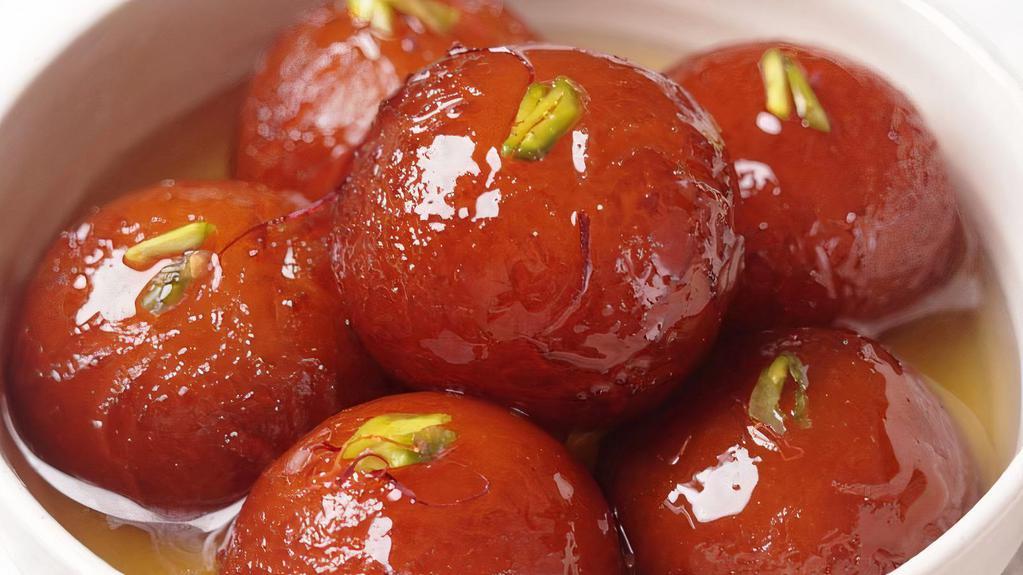 Gulab Jamun 2 Pcs
 · Soft and delicious fried milk balls and soaked in rose flavored sugar syrup.  Two pieces.