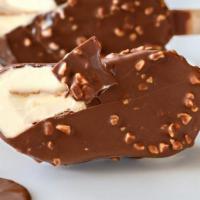 Magnum Almond Ice Cream Bar · Creamy vanilla ice cream covered in a milk chocolate shell with crunchy sea salt roasted alm...