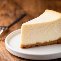 Ny Cheesecake · Creamy cheesecake with graham cracker crust.