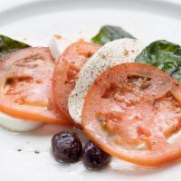 Caprese · Fresh mozzarella, fresh sliced tomatoes, evoo.