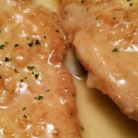 Chicken Francese · Batter-dipped served in a white wine and lemon sauce.