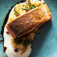 Grilled Salmon · brussel sprouts, artichokes, cauliflower, yogurt, capers, chili oil, and balsamic.