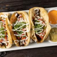 Tacos · Res, pollo, cerdo o camarones / Beef, chicken, pork or shrimp.