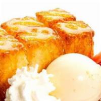 Golden Toast · warm crispy honey buttered toast, strawberries, served with condensed milk ice cream.