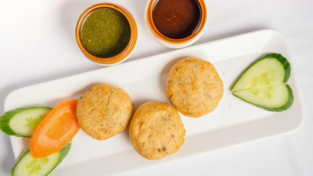 Aloo Tikki Appetizer · Shallow fried potato patties stuffed with spiced crumbles of homemade cottage cheese.