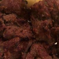 Barrah Kabab Appetizer · Boneless chunks of lamb marinated in yogurt, ginger, and garlic.