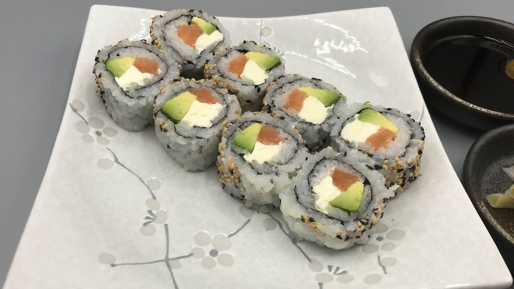 Philadelphia Roll (Raw) · Sushi rice, seaweed, salmon, avocado, cream cheese, sesame seed.