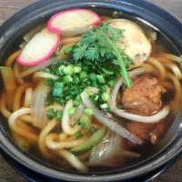 Udon · Thick noodle, zucchini, onion, scallion, fish cake in house broth.