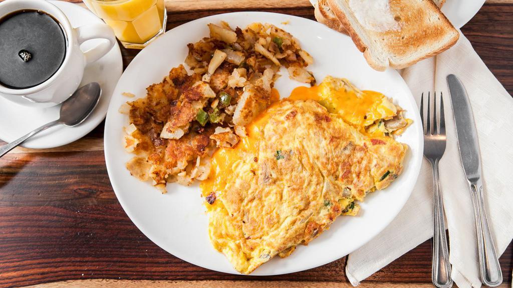 Western Omelette · Combination of diced ham, green peppers, and onions.
