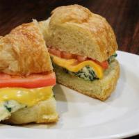 Power Breakfast Sandwich · Egg whites with spinach, tomato, and cheese on a croissant.