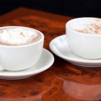 Premium Hot Chocolate (16 Oz) · Hot chocolate made with steamed milk.
