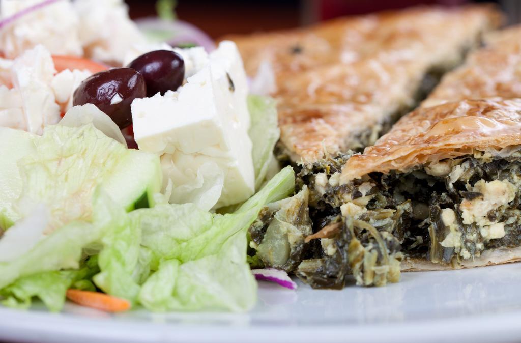 Spinach Pie Special · Homemade Greek spanakopita, stuffed with spinach and feta cheese served with a Greek salad.