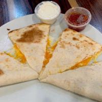 Cheese Quesadilla · Flour tortilla filled with a blend of mozzarella and cheddar cheeses. Served with sour cream...
