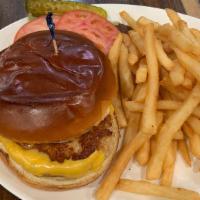 Turkey Burger Deluxe · Brioche bun topped with American cheese, lettuce, tomato, and ketchup. Served with french fr...