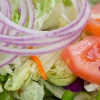 Garden Salad · Mixed greens, tomatoes, red onions, and cucumbers. Vegetarian.