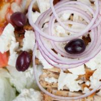 Greek Salad · Lettuce, Roma tomatoes, cucumbers, red onions, olives, and feta cheese. Vegetarian.