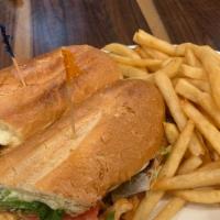 The Buffalo Bill Sandwich · Grilled buffalo chicken breast with bacon and Provolone on a toasted hero with lettuce, toma...