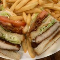 Crispy Chicken Triple Decker · Crispy chicken and bacon. Lettuce, tomato, and mayo on toast. Served with fries.