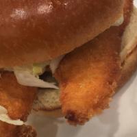 Fish Sandwich · Fried filet topped with lettuce, tomato, and mayo, served on a brioche bun.