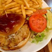 Grilled Chicken Sandwich Deluxe · Tender char-broiled chicken breast with lettuce, tomato, and mayo, served on a brioche bun.