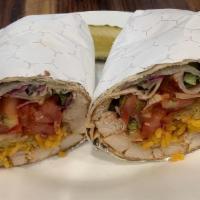 Chicken Fajita Wrap · Grilled chicken with roasted peppers, rice, lettuce, tomato, and salsa.