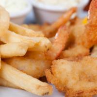Crispy Fish & Chips · Harlem style. Crispy deep filled whiting served with fries and coleslaw. Lemon and tartar sa...