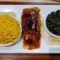 Teriyaki Salmon · Salmon fillet baked in a teriyaki glaze. served with two sides. served with a choice of pota...