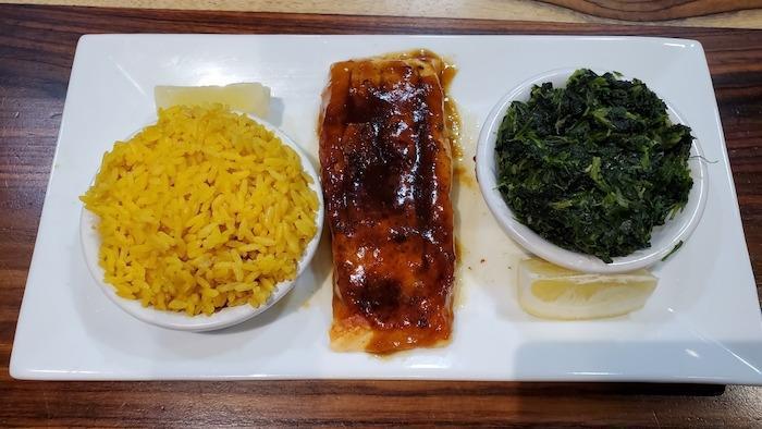 Teriyaki Salmon · Salmon fillet baked in a teriyaki glaze. served with two sides. served with a choice of potato or rice and salad or vegetables. served with bread.