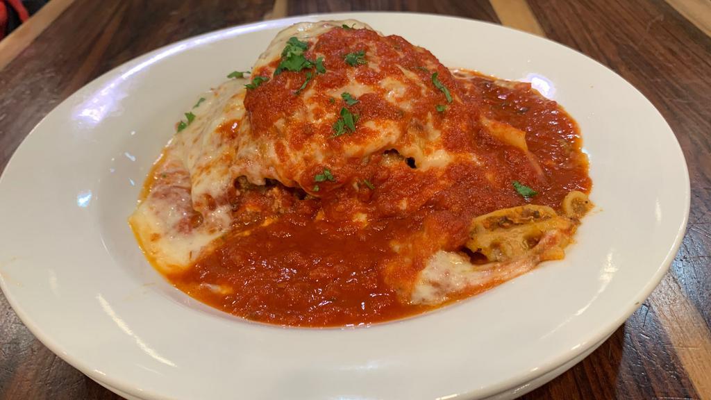 Lasagna · Home-made meat lasagna is a classic.