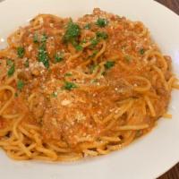 Spaghetti Bolognese · Spaghetti topped with a hearty meat sauce.