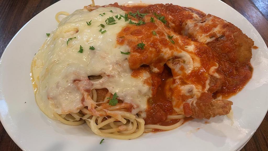 Jumbo Shrimp Parmigiana · Breaded fried jumbo shrimp topped with marinara sauce. Served with spaghetti and topped with Mozzarella and baked in brick oven.