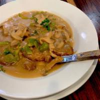 Veal Marsala Dinner · Tender breast of veal sauteed with mushrooms and green peppers in a marsala wine sauce.
