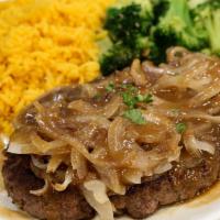 Chopped Steak Dinner · 1/2 pound of ground meat topped with grilled onions and gravy.