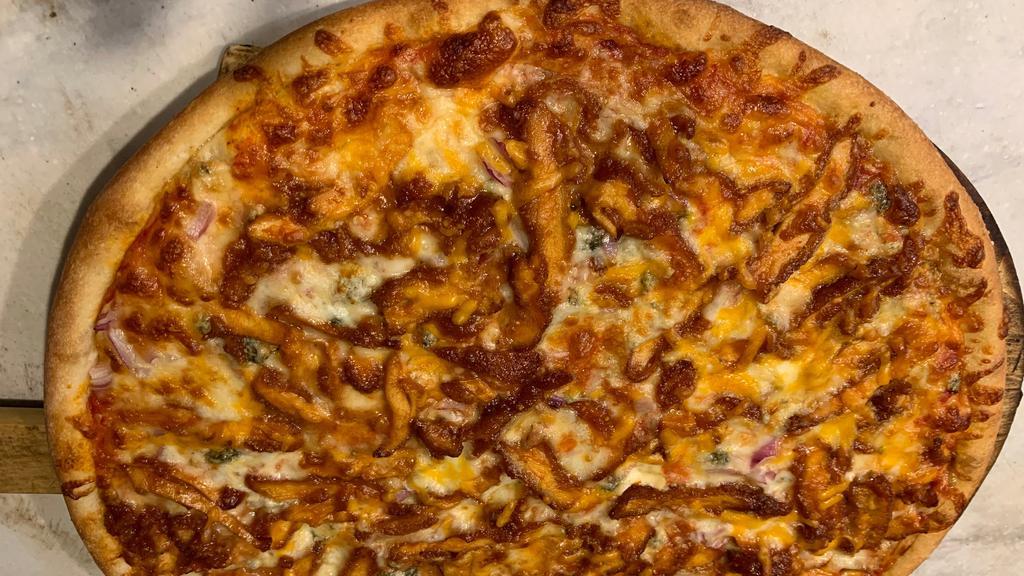 Bbq Chicken Pizza New York Style Pizza · Grilled chicken smothered in BBQ sauce, red onions, mozzarella, cheddar and drizzled with chunky blue cheese dressing.