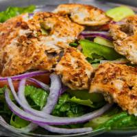Grilled Chicken Over A Garden Salad · Served with crackers and choice of dressing. Add protein for an additional charge.