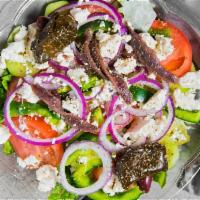 Greek Salad · Served with Feta cheese, kalamata olives, crackers and choice of dressing. Add protein for a...