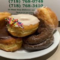 Regular Donut · Choose from Glazed, Choc Frost, Van Frost, Pink Frost, Jelly, Cream, Boston Cream, Sugar Rin...